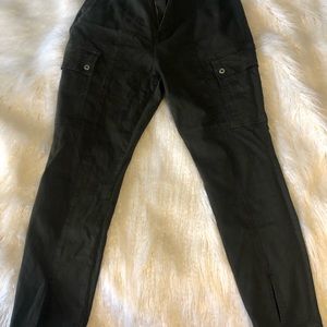 Good American Olive Cargo front seam jeans, with slit at bottom hem.